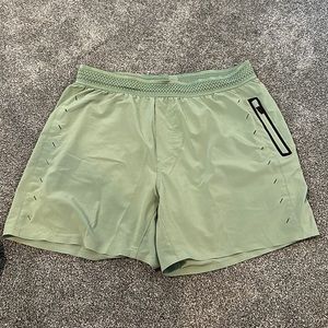 Men’s Ten Thousand Shorts in green with no built in liner; medium, used
